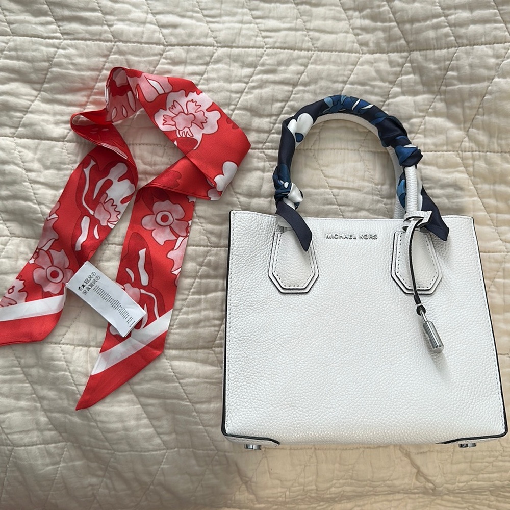 Brand new. Mini Michael Kors handbag. With 2 decorative scarfs.